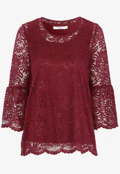 Blondetop med trompetærme