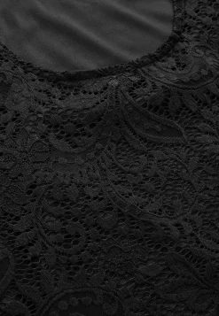 Blondetop med trompetærme