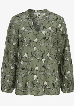 Bluse med et blomstermønster og struktur
