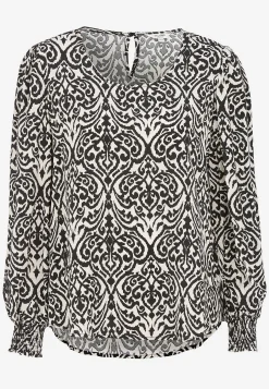 Bluse med smock ved manchetterne