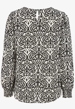 Bluse med smock ved manchetterne