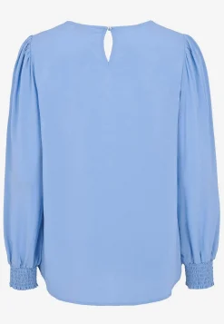 Bluse med smock ved manchetterne