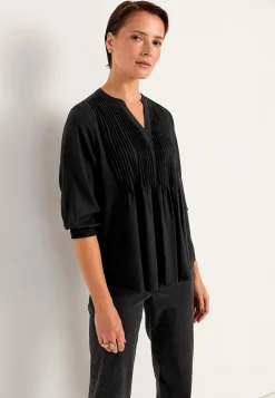 Bluse med syede lægge