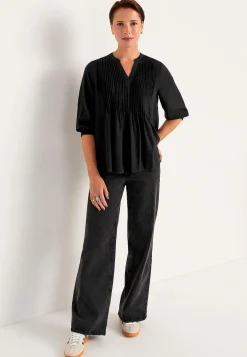 Bluse med syede lægge