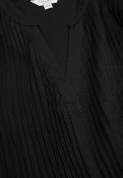 Bluse med syede lægge