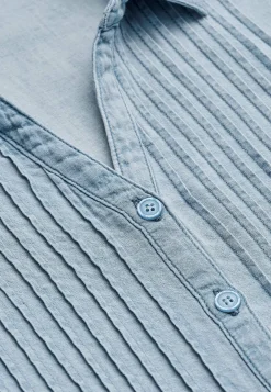 Cowboyskjorte med syede lægge