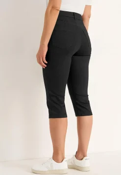 Elastiske crop jeans med syet pressefold