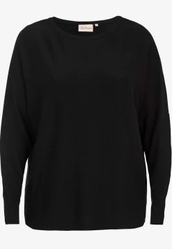 Fintstrikket trøje med knapper i ryggen