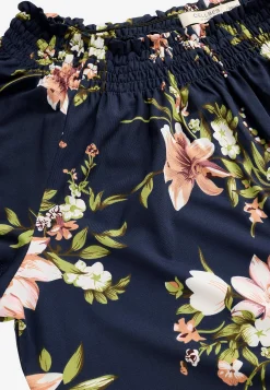 Jerseykjole med et blomstermønster