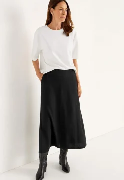 Jerseynederdel med svaj med lommer