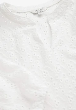 Jerseytop med broderet hulmønster | Cellbes