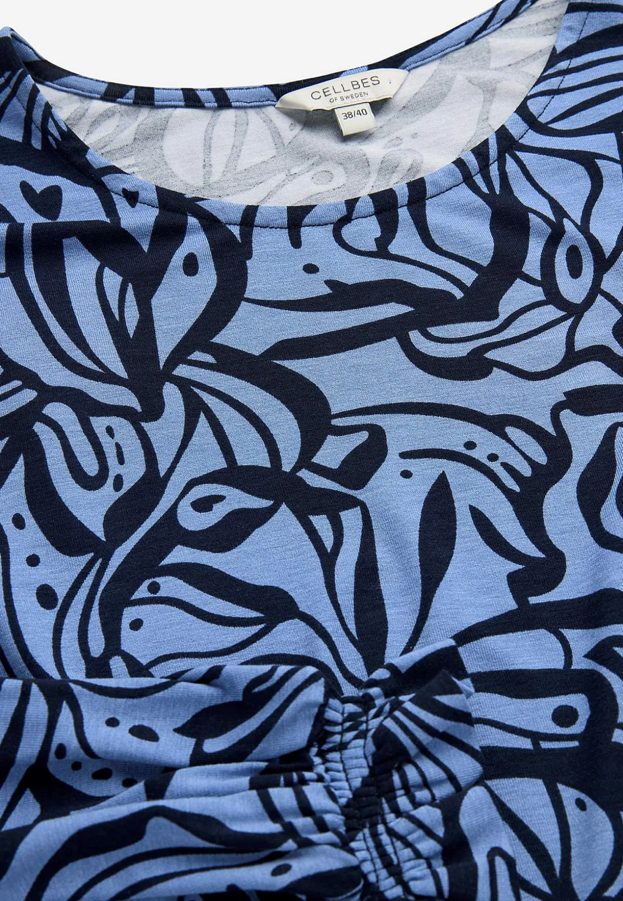 Jerseytunika med smockdetalje