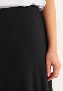 Lang jerseynederdel med svaj