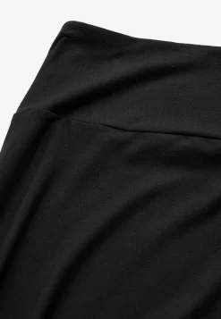 Lang jerseynederdel med svaj