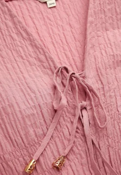 Langærmet kjole med knudedetaljer