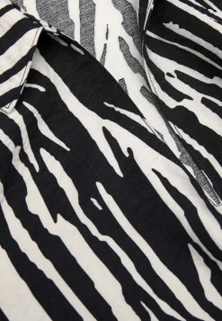 Langærmet, vævet tunika