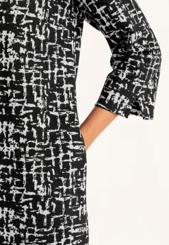 Mønstret kjole med sidelommer