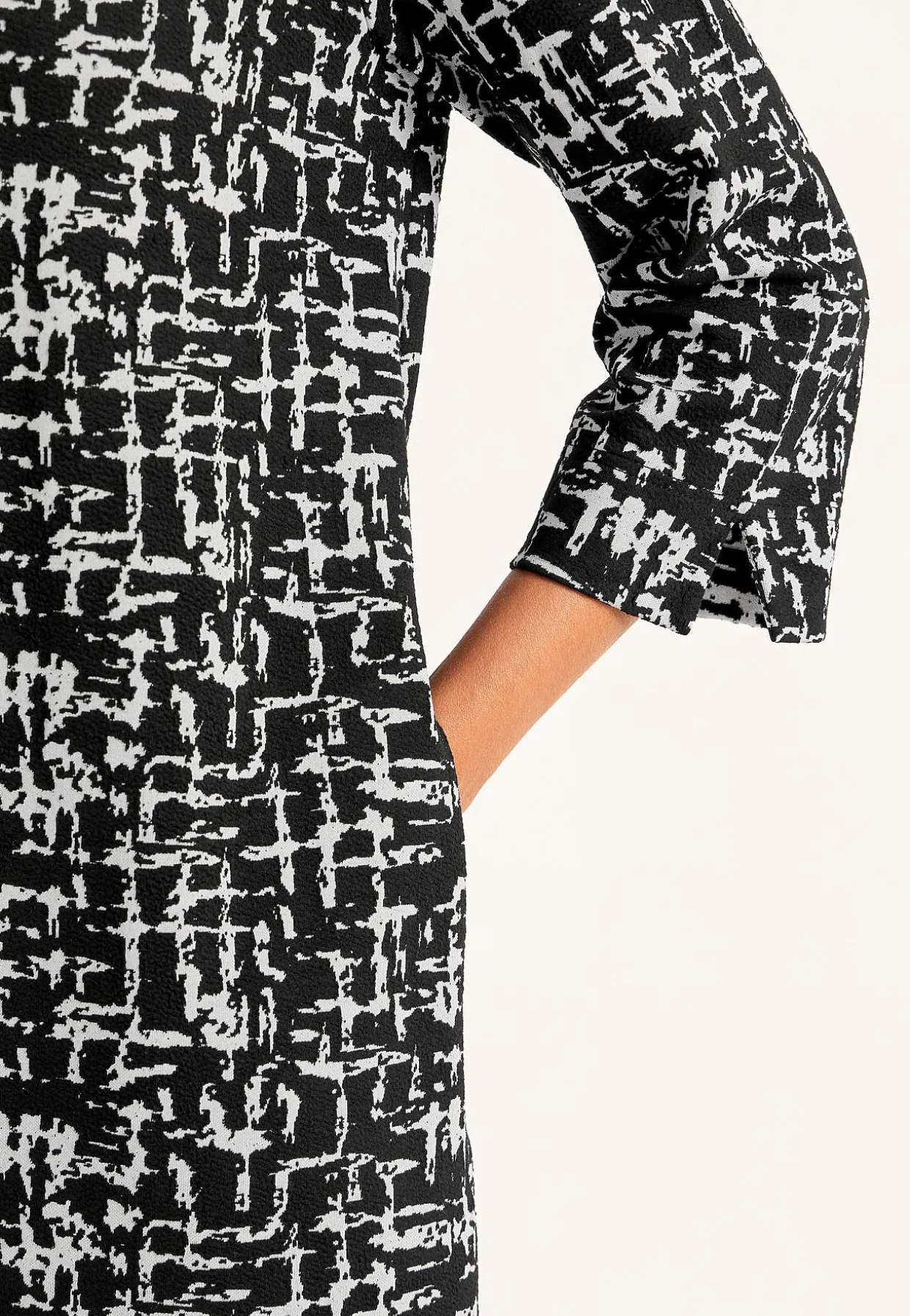 Mønstret kjole med sidelommer