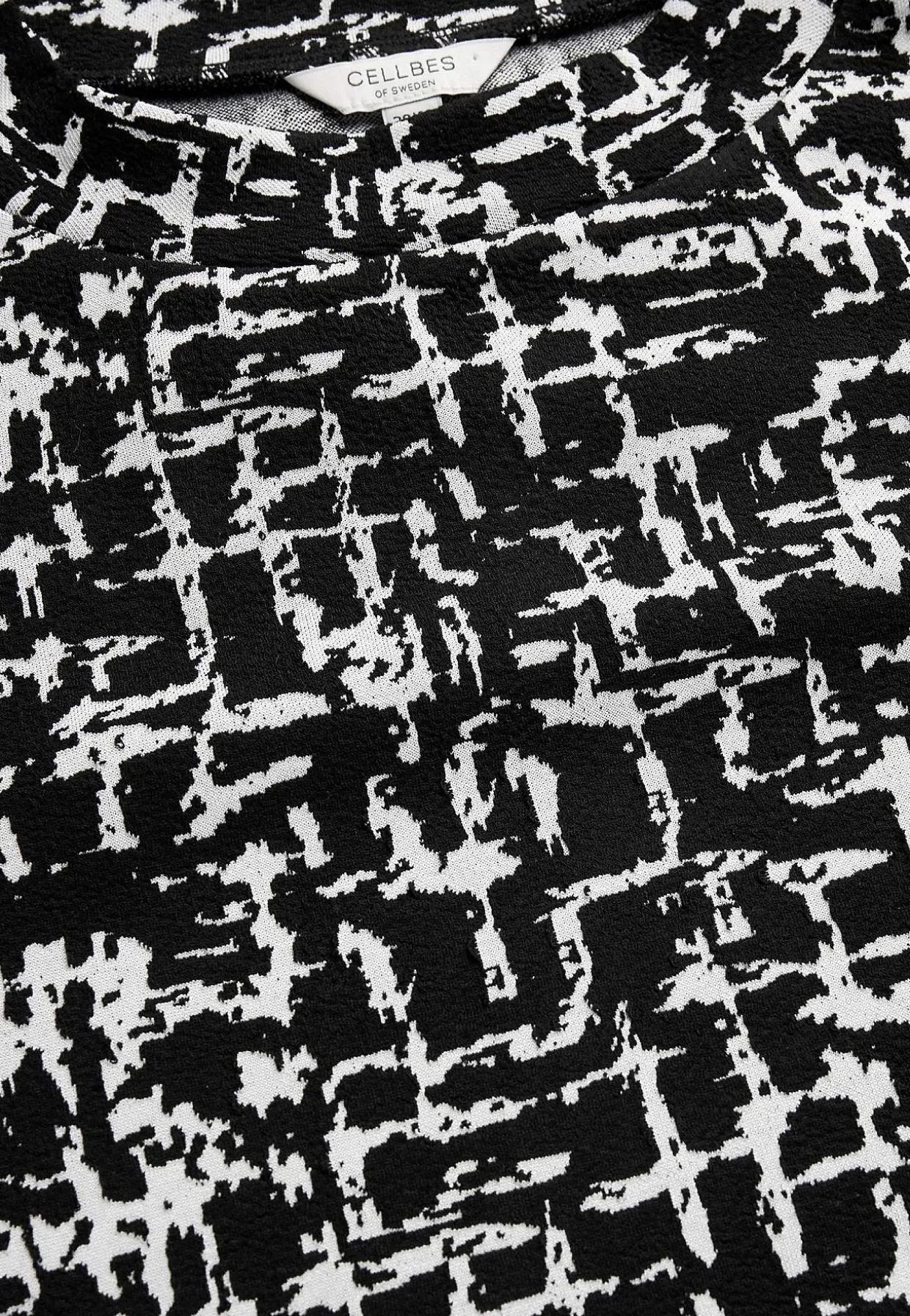 Mønstret kjole med sidelommer