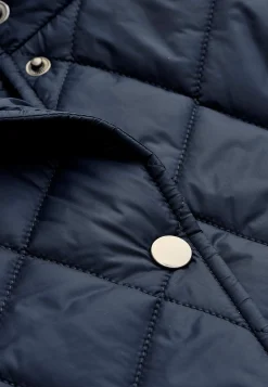 Quiltet jakke med trykknapper