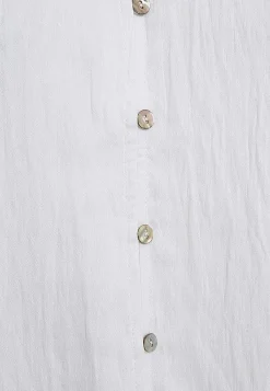 Ærmeløs bluse med rynkedetaljer