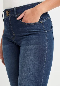 Shaping-jeans med bootcut og superstræk