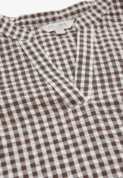 Småternet bluse i seersucker