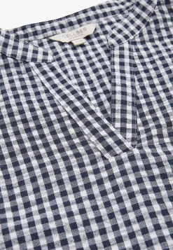 Småternet bluse i seersucker