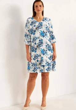 Sommeragtig festkjole med volanter