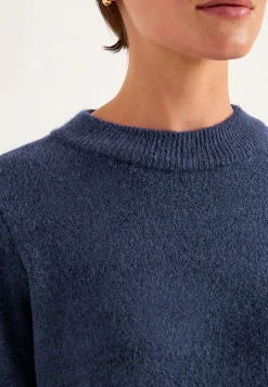 Strikket trøje med afrundet krave