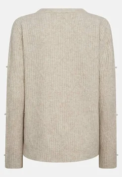 Strikket trøje med perledetaljer