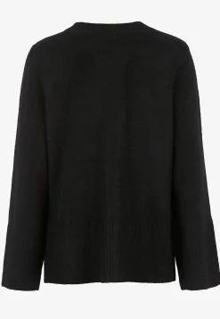 Strikket trøje med slidser