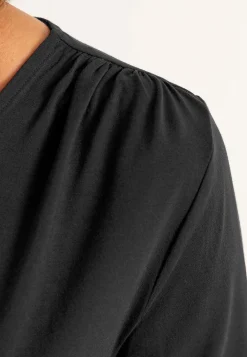 Top Premium i modal med rynkedetaljer