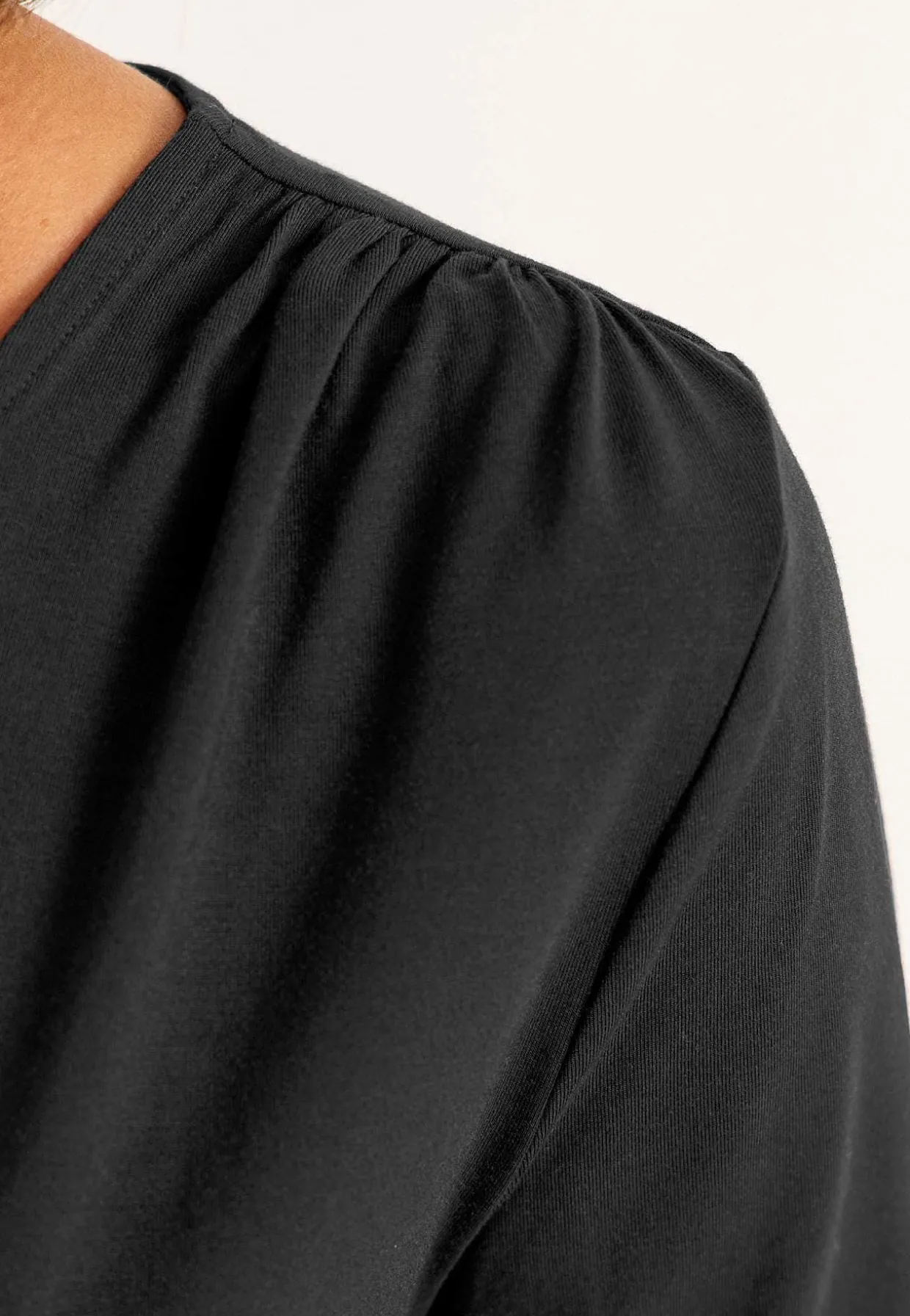 Top Premium i modal med rynkedetaljer