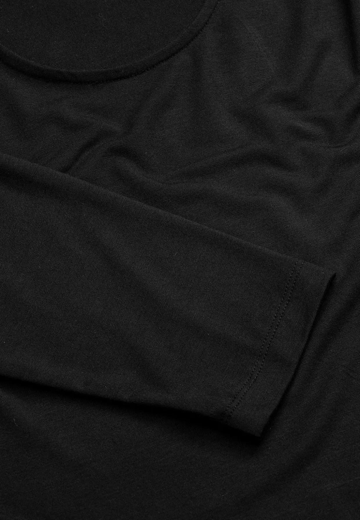 Top Premium i modal med rynkedetaljer