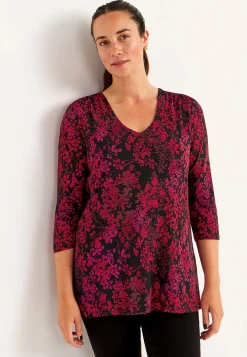 Tunika med et blomstermønster