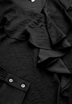 Tunika med flæsekrave