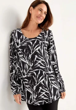 Tunika med strukturvævet stof