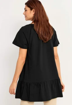 Tunika med volant nederst