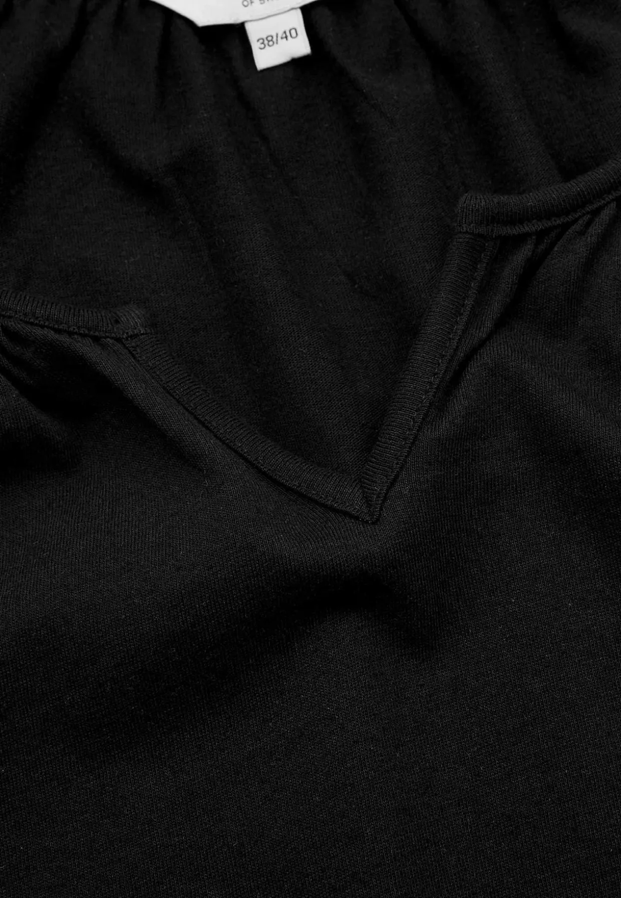 Tunika med volant nederst