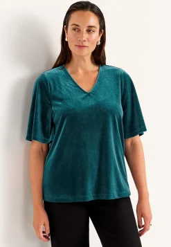 V-udskåret fløjlstop