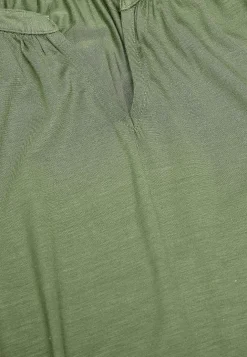 V-udskåret jerseytunika