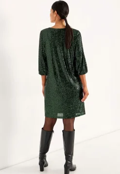 V-udskåret pailletkjole