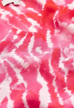 V-udskåret tunika med trompetærme