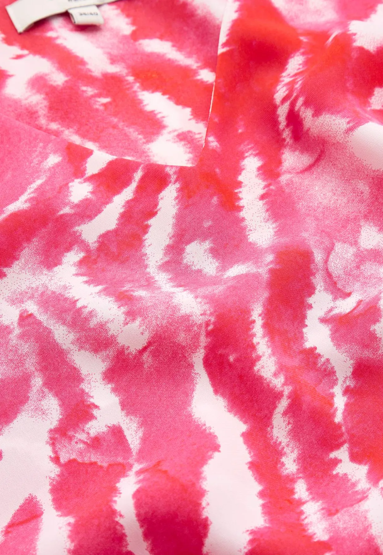 V-udskåret tunika med trompetærme