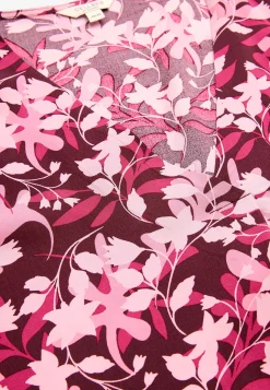 V-udskåret, vævet tunika