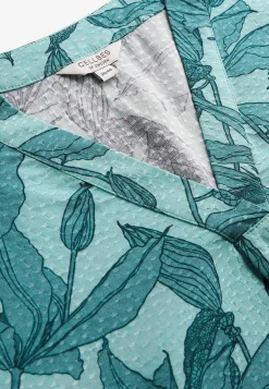 Vævet bluse med pufærme