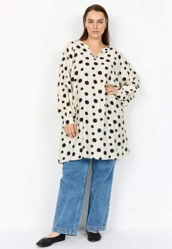 Vævet, prikket tunika